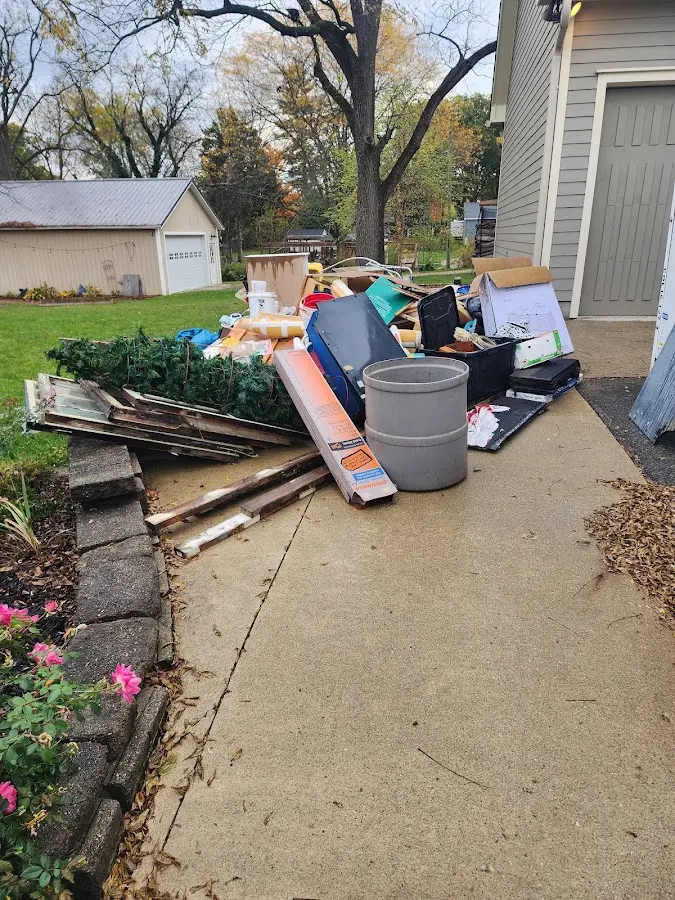 Dumpster being loaded with debris for 3 Yard Dumpster Rental in East Rockhill